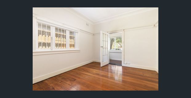 Two bedroom ground level apartment - Photo 1