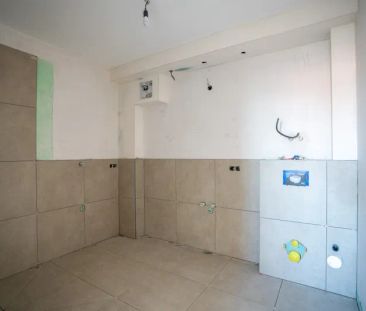 Eine Neubauwohnung mit einem sehr großen Garten und einer tollen Te... - Photo 4