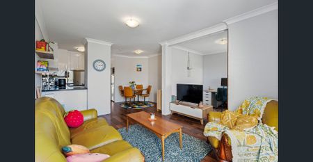 Top-Floor Living with Pool Views - Photo 5