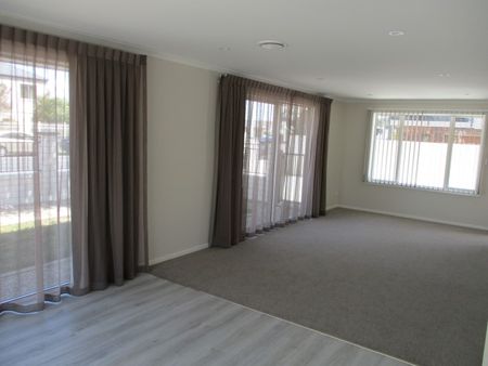 This beautifully designed three-bedroom, two-bathroom townhouse offering the perfect blend of style, comfort, and modern convenience. - Photo 4