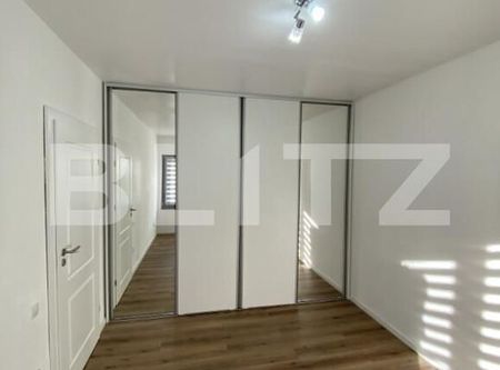 Apartament la casa, 2 camere, LUX, 60mp, curte 40mp, 4 min de aeroport - Photo 2