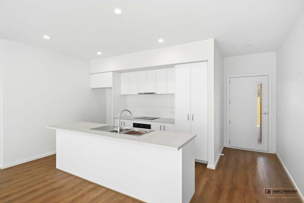 BRAND NEW IN QUALITY CENTRAL LOCATION - Photo 1
