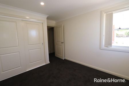 Two Bedroom Townhouse Close to CBD- Available 12.1.2026 - Photo 5