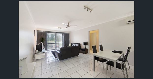 FIRST FLOOR UNIT WITH GOLF COURSE VIEWS & FANTASTIC BREEZES! - Photo 1