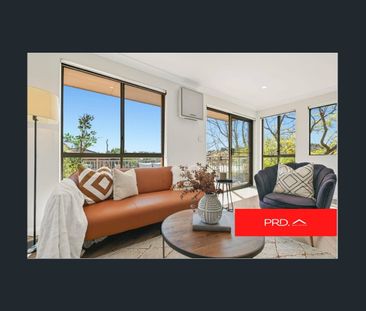 RENOVATED UNIT IN PRIME LOCATION - Photo 1