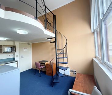 Loft Style Unit In The Heart Of Broadway - Photo 2