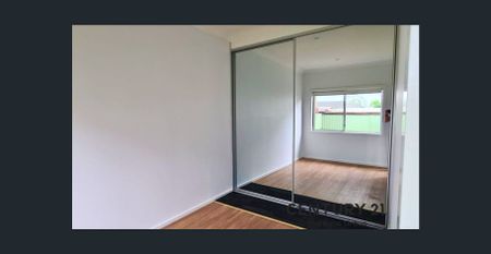 Spacious 4-Bedroom Family Home in a Great Location! - Photo 2