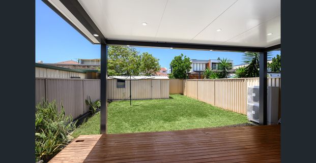 Stylish Entertainer's Duplex in a Lifestyle Location - Photo 1