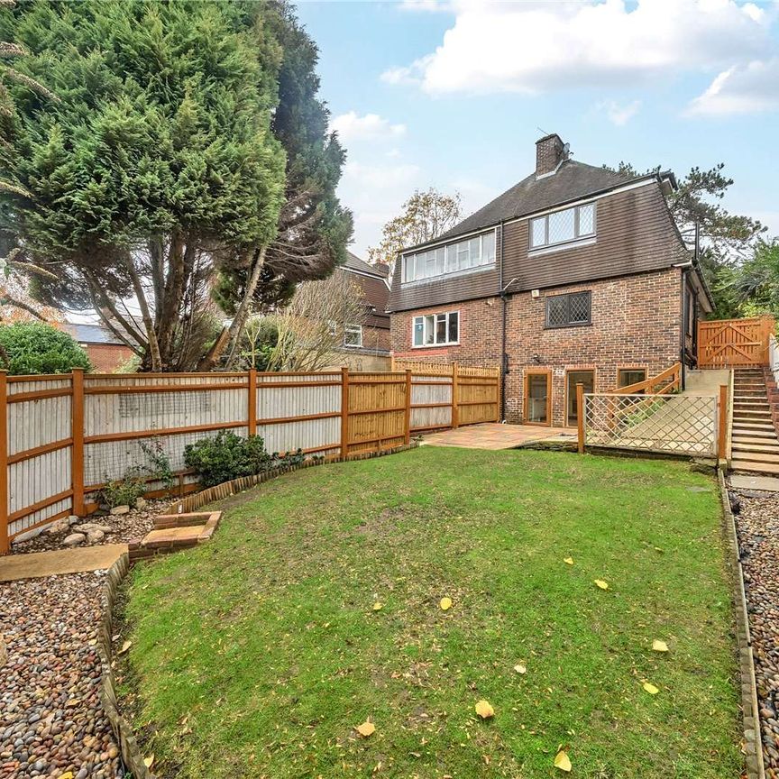 An attractive family home in an ideal location for town, schools and station. - Photo 1