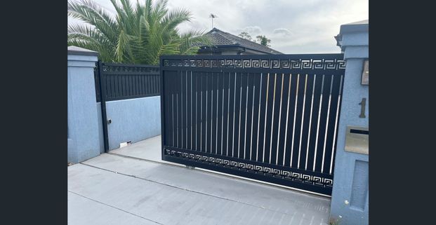 A FANTASTIC HOME WITH 2 KITCHENS & ELECTRIC GATES - Photo 1