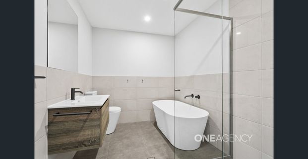 MODERN FAMILY HOME WITH COMFORT AND CONVENIENCE IN BADAGARANG - Photo 1