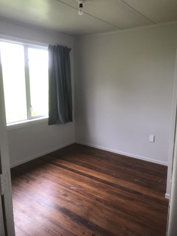 This home is need of a family, it has three bedrooms - one is of single size, open plan living, dining and kitchen, wooden floors throughout, bathroom with shower and toilet, separate laundry with a second toilet, double glazed, new coat of paint inside and out, and new curtains. - Photo 4