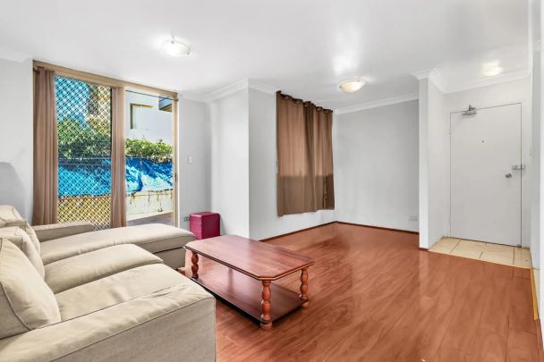 Discover effortless riverside living in this bright and spacious 2‑bedroom ground‑floor apartment - Photo 1