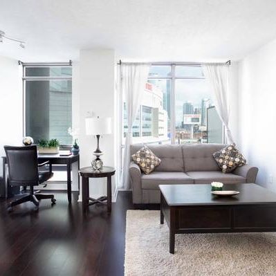 1 Bedroom Condo w/ Den, Prime Downtown Location - Photo 1