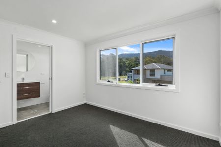 Modern 3-Bedroom Duplex Offering Style and Low-Maintenance Living! - Photo 5