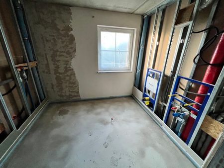 Schicke, barrierefreie 2-ZKB-Neubauwohnung in ruhiger Ortsrandlage mit Aufzug und Südbalkon - Photo 3