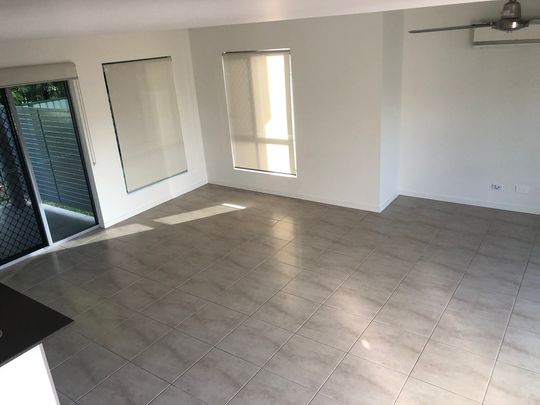 Fully fenced low maintenance yard - Photo 1