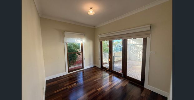 CENTRALLY LOCATED LOW MAINTENANCE HOME - Photo 1