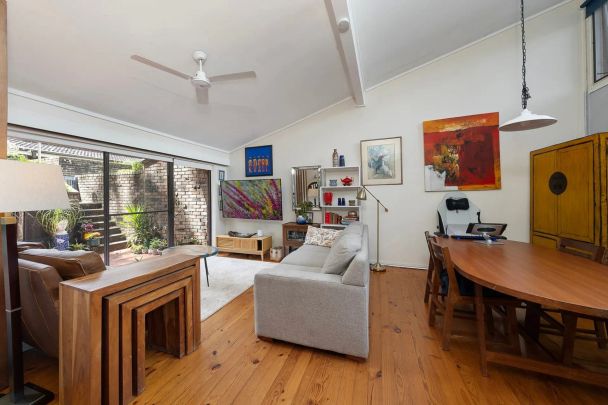 Sunlit Split-Level Townhouse Offering Space, Style & Convenience - Photo 1