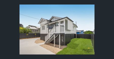 Freshly Renovated Family Home in Prime Albion Location - Photo 4