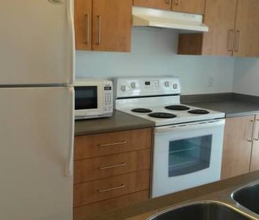 Location! 2bdms, 2baths Hi-Rise w/ view in Collingwood area, Vancouver - Photo 3