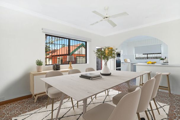 REJUVENATED AIR-CONDITIONED FAMILY HOME IN SOUGHT AFTER STREET - Photo 1