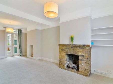 An ideal three bedroom cottage well located "between the commons" - Photo 3