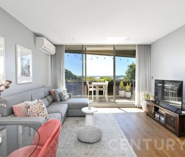 Elevated Luxury with Soaring Ceilings & Water Views - Photo 1