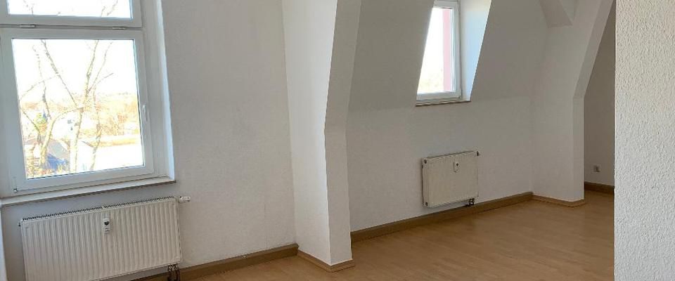 Schöne 3-Zimmer Wohnung im DG in Haus mit großem Garten - Photo 1
