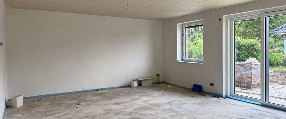 Erstbezug: Moderne Bungalowhälfte mit Einbauküche & Carport in ruhiger Siedlungslage von Wiesmoor - Foto 1