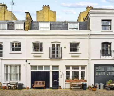 A beautifully presented three bedroom mews house located in the hea... - Photo 6