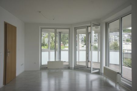 Helle 2-Zimmerwohnung mit EBK, STP und großem Balkon in ruhiger Seitenstraße! - Photo 4