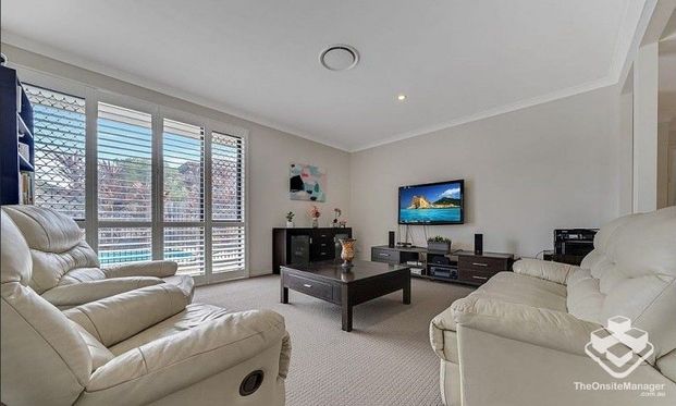 CreateMODERN EXECUTIVE RESORT STYLE RESIDENCE ON 812m2 BLOCK Listing - Photo 1