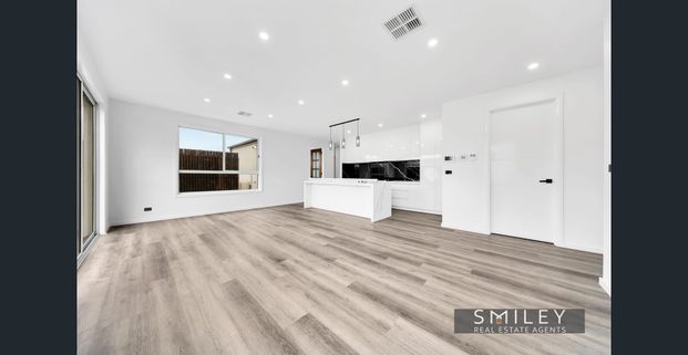 Modern Comfort • Premium Location • Family Convenience - Photo 1