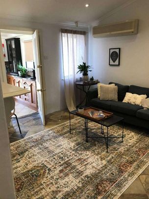 Wow! What a location and what a charming cottage, so close to everything! - Photo 1