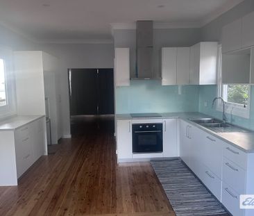 TAREE WEST - Stylishly Renovated Home with Expansive Decking - Photo 4