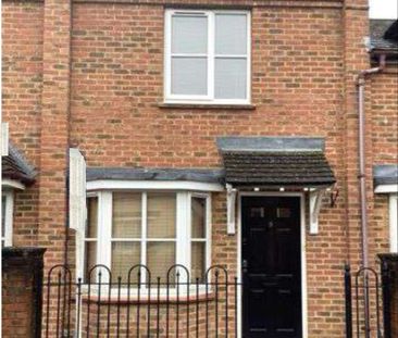 A two bedroom mid-terrace property with two double bedrooms, garage... - Photo 1