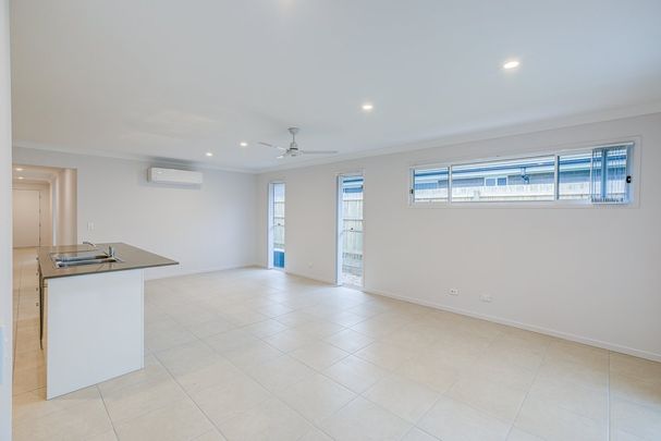 Brand-New Family Home in Park Lane Reserve! - Photo 1