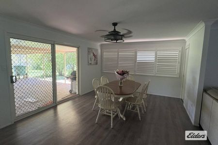 NEW TO THE RENTAL MARKET – SPACIOUS 4-BEDROOM BRICK HOME ON ¾ ACRE - Photo 3