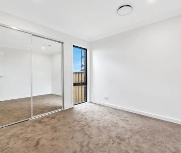 “4 Bedroom Quality Home” - Photo 3