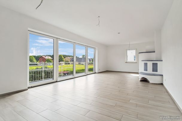 Moderne und großzügige Wohnung mit Einbauküche und Süd-Balkon - Photo 1