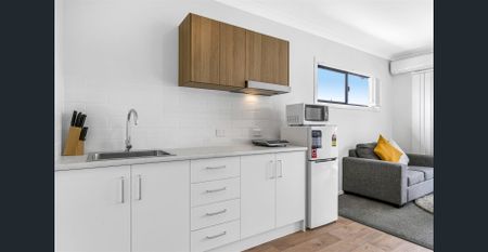 NEAR NEW FURNISHED STUDIO - Photo 4