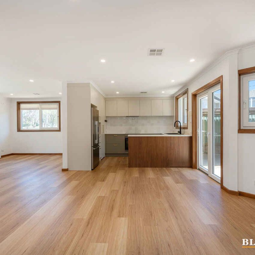 A Renovated 4-Bedroom Gem with Endless Potential - Photo 1