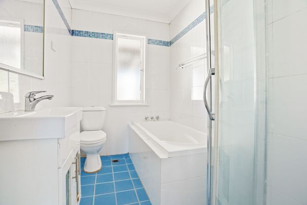 Spacious Family Home in Prime Location - Photo 1