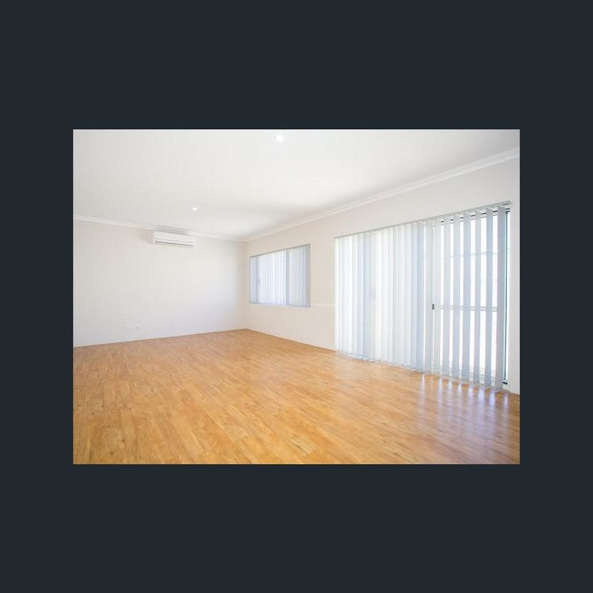 Coastal Comfort: Your Family Home Steps Away from the Beach! - Photo 1