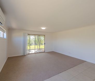 Comfortable 4-Bedroom Home with Large Outdoor Space - Photo 1