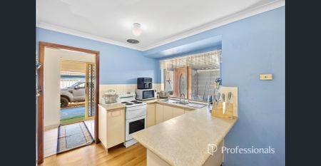 Solid Home Offering Practical Living and Plenty of Space - Photo 3