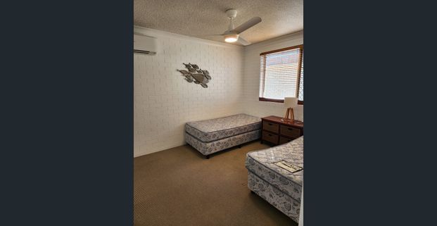 Fully furnished unit just steps from beautiful Kellys Beach - Photo 1