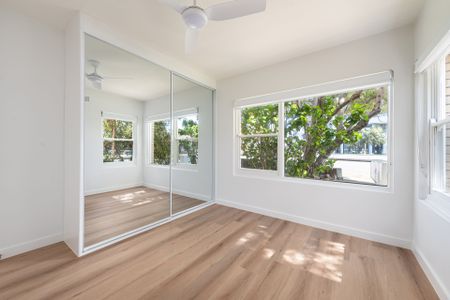 Stylish & Spacious 2-Bedroom Unit with Lock-Up Garage - Photo 4