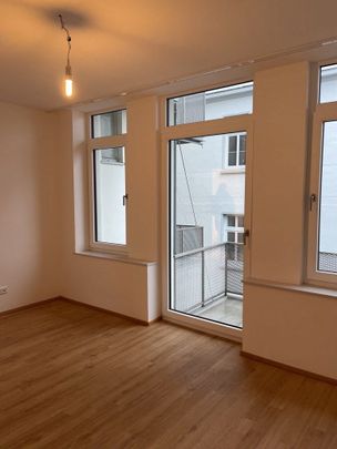 Stilvoll wohnen am Kesselbrink – moderne 2-Zimmer-Wohnung mit Einbauküche und Balkon - Photo 1